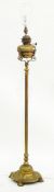 19th century brass standard oil lamp, with circular base, column stem,
