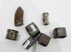 Pair of silver napkin rings of square design, with engine-turned sunburst decoration,