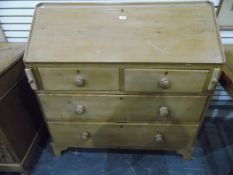 Pine bureau, the interior fitted the usual pigeonholes and small drawers,