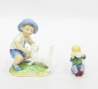 Royal Worcester Doughty model of 'September' depicting a boy with kitten,