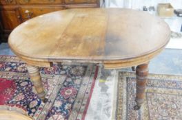 Late Victorian mahogany wind-out extending dining table having one insert leaf,