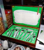 Canteen of cutlery in fitted walnut case and two further cutlery sets