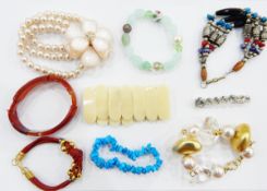 Quantity of vintage bangles including a mottled turquoise plastic example,