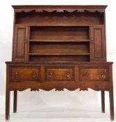Late 19th century oak and mahogany banded dresser, the upper section with flat moulded cornice,