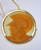 9ct gold and porcelain cameo portrait brooch, in the form of a Roman centurion's head, circular,
