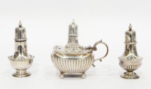 Silver mustard, Sheffield 1901, of half-fluted rectangular form, a pair of silver pepperettes,