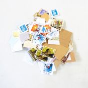 Box containing a large quantity of loose GB stamps, mainly QEII including mint, used and unused on