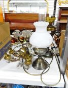 Two brass paraffin lamps converted to electricity and a pair of gilt metal wall lights