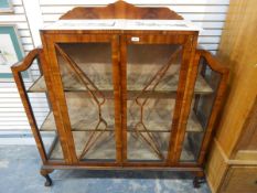 Walnut veneered circa 1930's display cabinet in the Art Deco style,