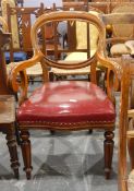19th century mahogany-framed elbow chair having open scroll arms and on fluted supports with button