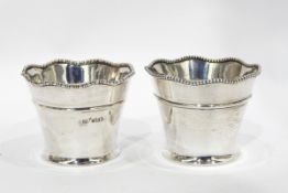 Near pair of early 20th century silver bowls with wavy beaded rim, tapered body,