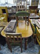 Old oak wind-out dining table with moulded edge, on turned baluster legs, with two extra leaves,