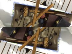 Late 19th/early 20th century indoor miniature croquet set comprising four mallets,