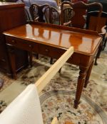 Mid 19th century mahogany washstand with shaped backboard, moulded edge,