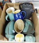 Two sage green Denby casserole dishes with two matching jugs and a sugar bowl and other Denby items