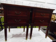 Pair of mahogany side tables with raised border surrounds and two short drawers below,