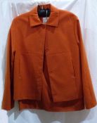 Betty Berkeley orange woollen skirt suit, Betty Berkeley grey suede jeans,