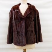 Squirrel jacket marked 'Sefton Marks,