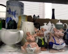 Collection of Nat West money box pigs including four babies, a school boy and a school girl,