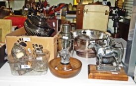 Quantity of silver-plated items to include a silver-coloured metal figure of a hunter on stand,