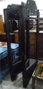 Carved ebonised four-fold screen (missing panels),