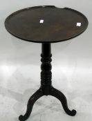 19th century circular mahogany dish-top tripod table on turned column,