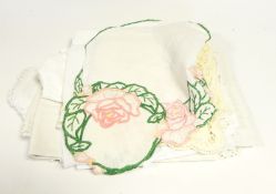 Quantity of assorted dolls clothes in suitcase