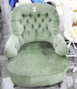 Late 19th century button upholstered tub chair on turned supports and castors