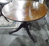 Circular mahogany tilt-top breakfast table of Regency design,