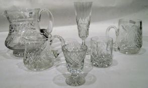 Two glass decanters, various glass jugs, four tumblers,