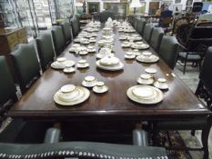 19th century mahogany banqueting table, the rectangular top with deep moulded border,