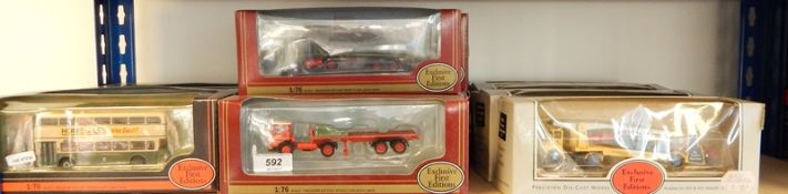 Collection of Exclusive First Edition diecast model buses and lorries in window boxes