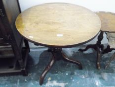 Circular mahogany tripod pedestal table,