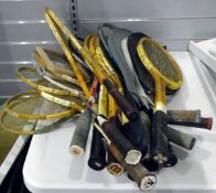 Quantity of wooden tennis racquets and various badminton/squash racquets