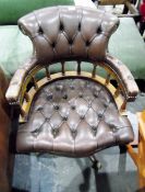 Studded leather upholstered, mahogany-framed,