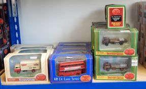 Collection of Exclusive First Edition diecast model buses and lorries in window boxes