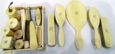Early 20th century ivory dressing table set comprising miniature clock, dressing table brushes,