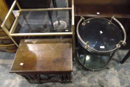 Mahogany Sutherland table, a circular glass-topped trolley with gilt metal handles, under-shelf,