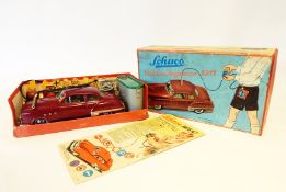 Schuco Elektro Ingenico 5311 remote control tinplate car with paper road maps,