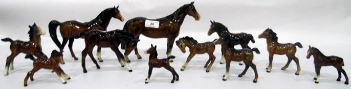 Two Beswick brown model horses and nine Beswick model foals (11)