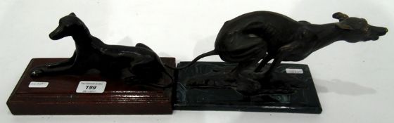 Bronzed-finish model of a greyhound on a wooden rectangular plinth base,