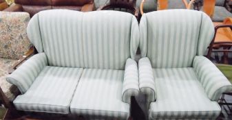 Two-seat wing back settee in regency-type striped fabric and a matching armchair (2)