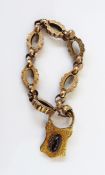 Victorian gold-coloured chain link bracelet of engraved oval open and scalloped links alternating