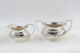 Victorian silver two-handled sugar bowl and matching cream jug by Thomas Hayes, Birmingham 1898,