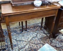 19th century oak rectangular fold-out card table on turned supports,