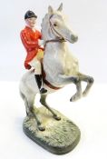 Beswick huntsman leaping on grey horse, no.