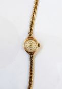 Lady's Smiths 9ct gold bracelet watch with baton markers and with 9ct gold herringbone bracelet