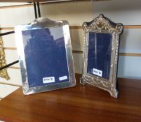 Modern silver-mounted photograph frame with arch and scroll top,