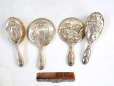 Silver-backed three-piece dressing table set by Henry Matthews, Birmingham 1911/12,