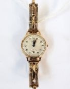 Lady's Buren gold wristwatch with 9ct gold strap